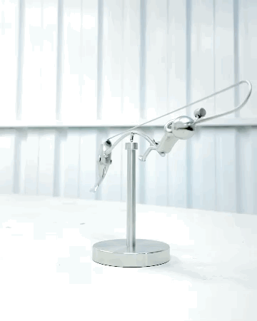 🎣Die balancierende Fischerskulptur